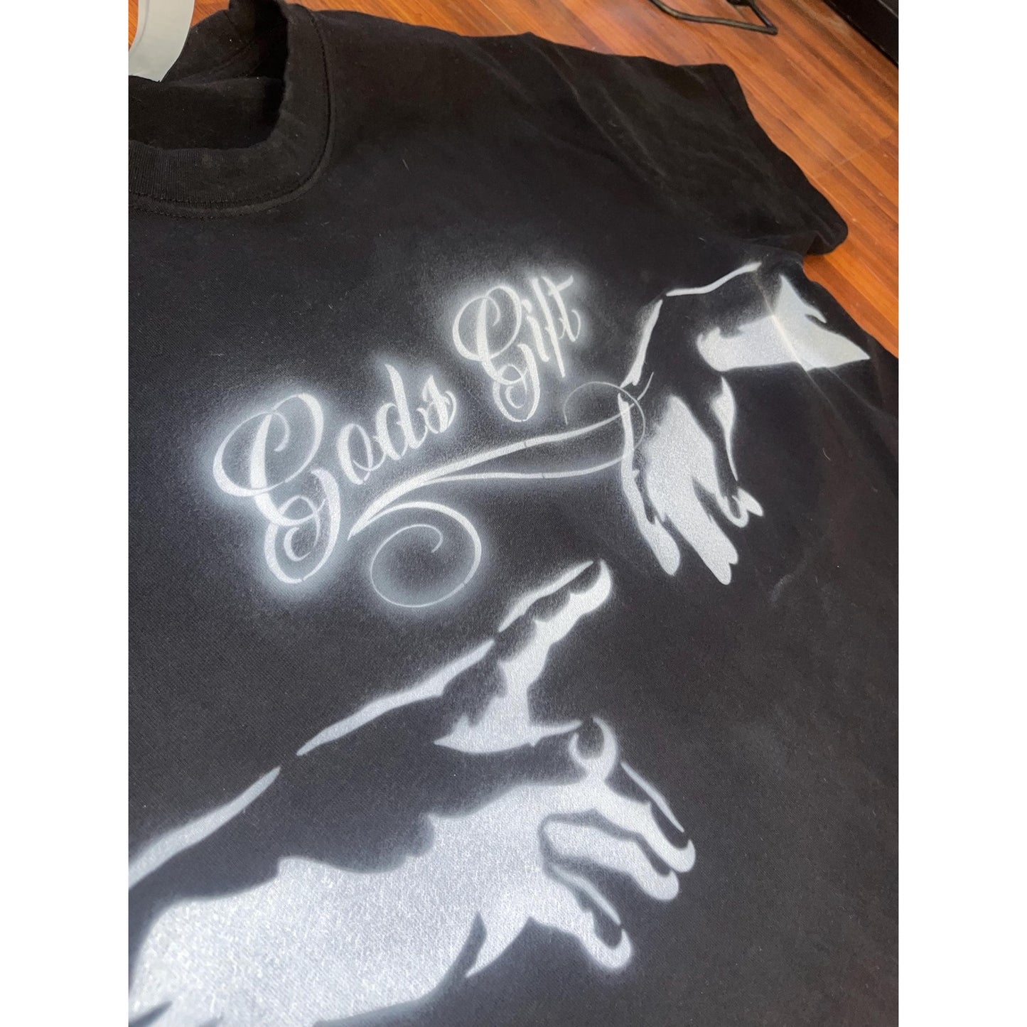 Heavy cotton All black “Made of Blessings” Hands of God T shirt. Handpainted Airbrushed with fabric paint. Safe to wash