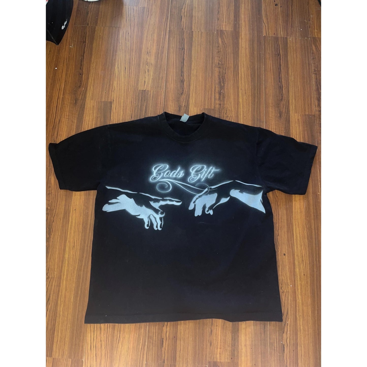 Heavy cotton All black “Made of Blessings” Hands of God T shirt. Handpainted Airbrushed with fabric paint. Safe to wash